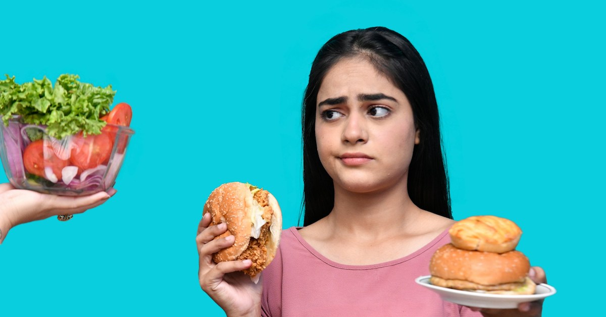 choice between a healthy salad or fried and processed foods